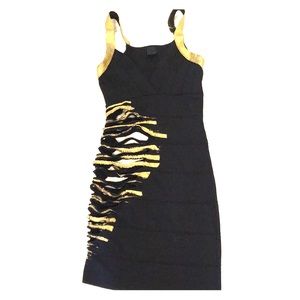 Black and gold bandage dress with cutout sides